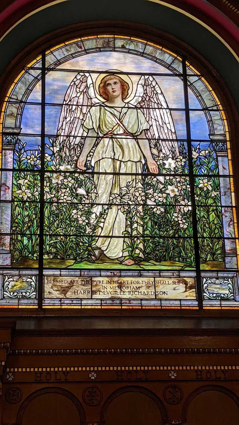 Look Closely At The Angel Among The Lilies