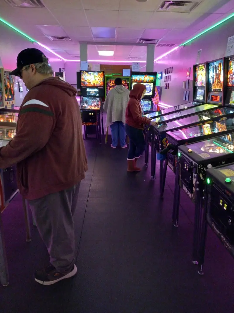 Friendly Faces Behind The Counter Who Clearly Love Pinball