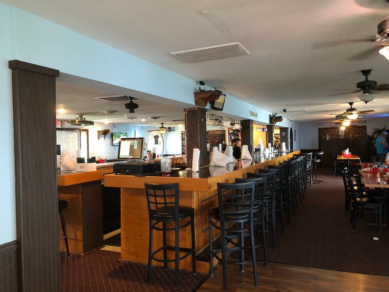 Inside, A Long Wooden Bar Keeps Things Easygoing