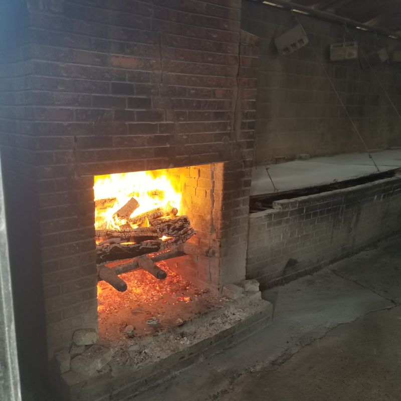 Wood Coals And Whole Hogs Are The Only Way This Family Rolls