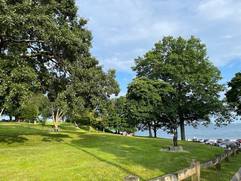 Wander Past The Sand For Grass, Picnics, And Sunset Views
