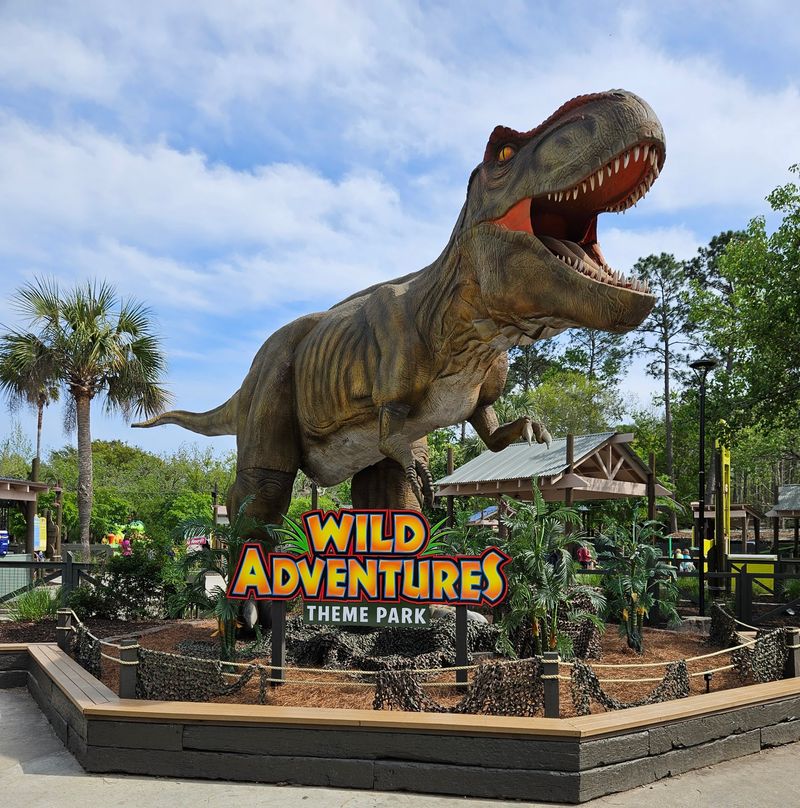 A 26-Foot Brachiosaurus Is Waiting For Your Kids Behind The Trees