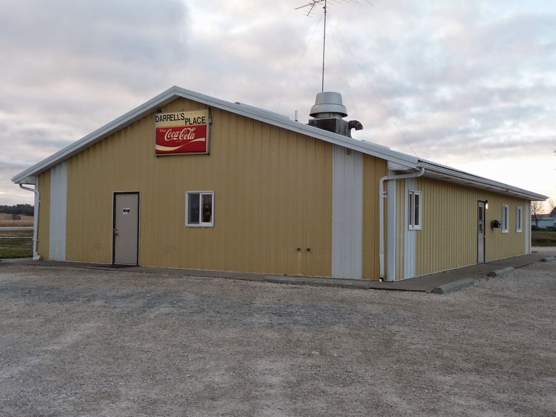 An Old Bank Came First, Then A Yellow Machine Shed