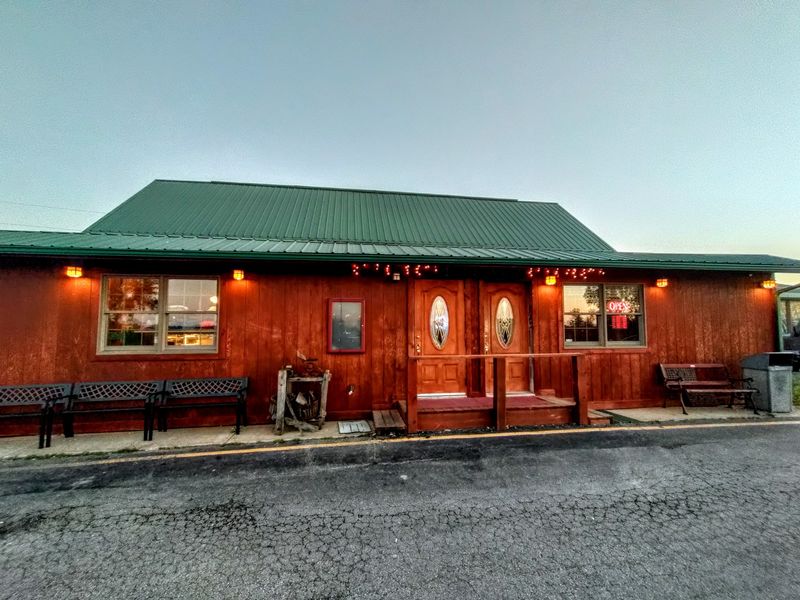 A Log Cabin Steakhouse Sitting Close To The Dam