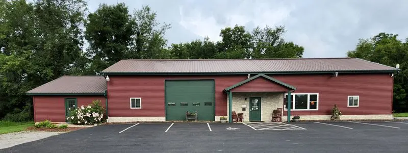 The Shop Sits Out Back, So Slow Down On That Country Road