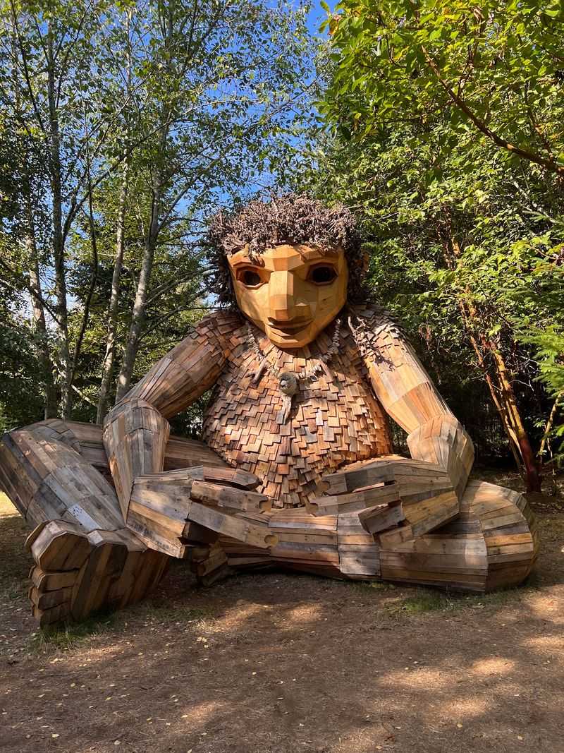 A Giant Wooden Troll Is Waiting For You In The Woods