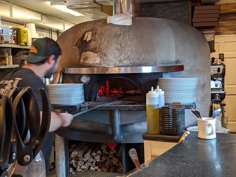 A Pizza Oven That Needed A Hole In The Roof Deserves Your Full Attention