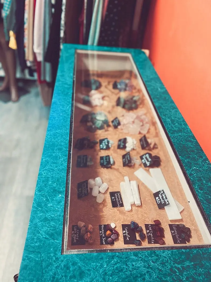 Crystals, Tarot, And Candles Hiding Between The Racks